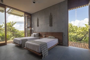 Third bedroom with two balconies.