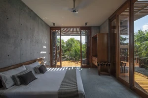 Second Master bedroom with private patios.