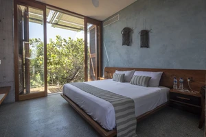 Fourth bedroom with a balcony.